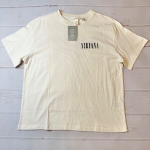 NWT - H&M - Women’s Beige Nirvana Short Sleeve Shirt - Size Large . Brand new wi